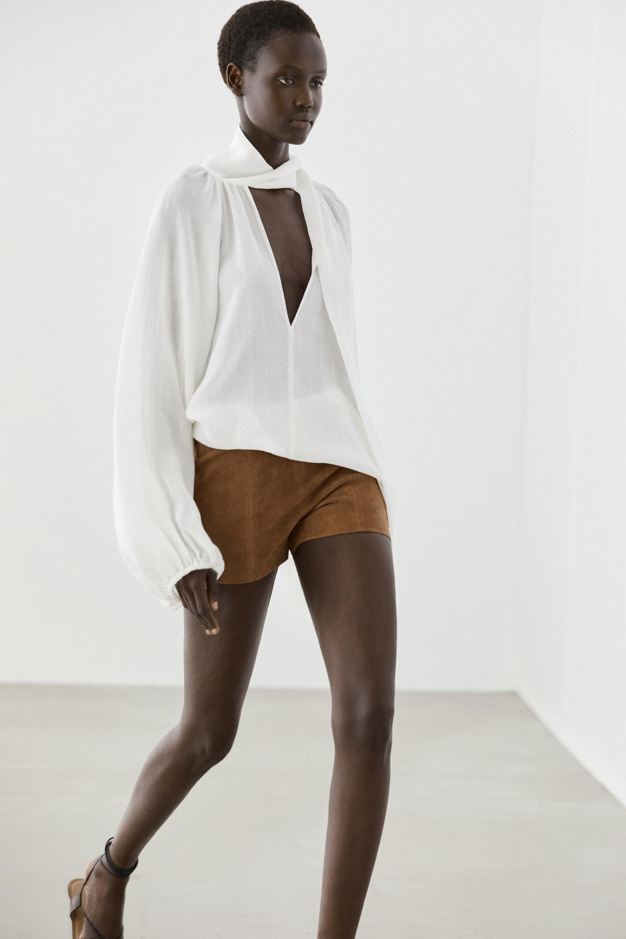 Blouse fluide col en V avec nœud